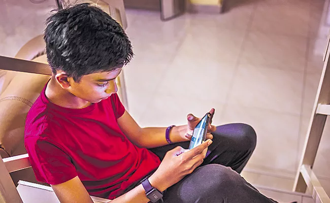 Cyber Crime: Smartphone Addicted Son Hacked Parents Account Money - Sakshi