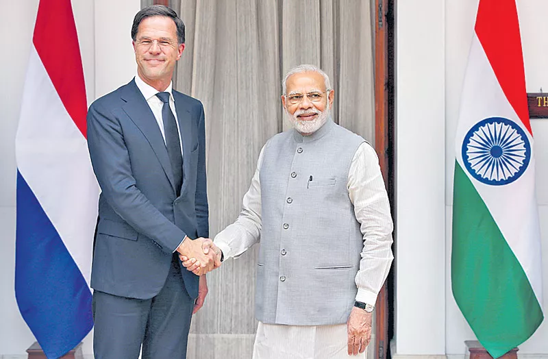Prime Minister Narendra Modi Meet With Netherland Prime Minister Mark Rutte - Sakshi