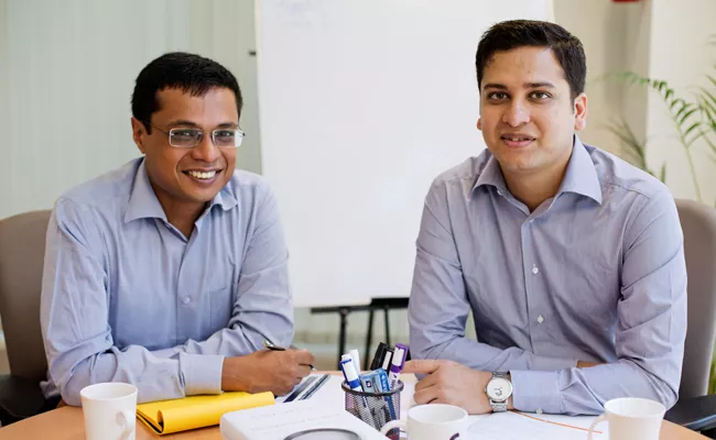 I-T Dept sends tax notices to Flipkart founders Binny Bansal, Sachin Bansal - Sakshi