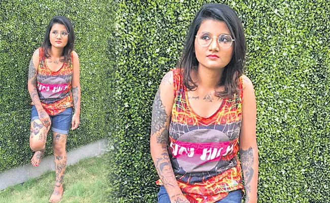 Tejaswi Prabhakar has 103 tattoos on her body - Sakshi