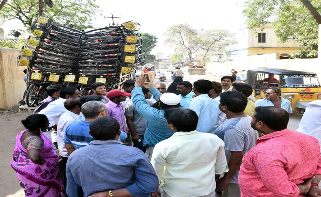 Bicycle For Voters In Nellure - Sakshi
