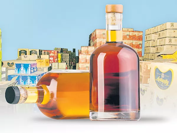 Financial burden Downward On alcohol manufacturing companies - Sakshi