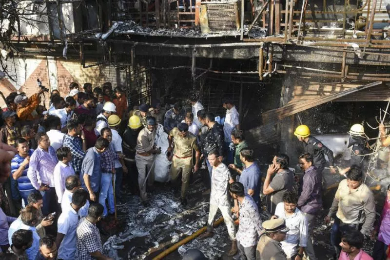 Surat Fire Accident Class 10 Girl Saved in Massive Fire Says Did Not Panic - Sakshi