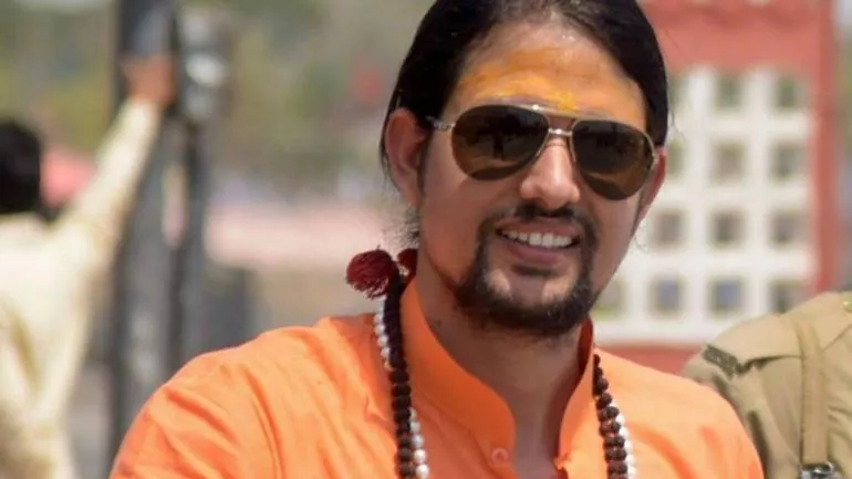 Yoga Guru Anand Giri Arrested In Australia - Sakshi