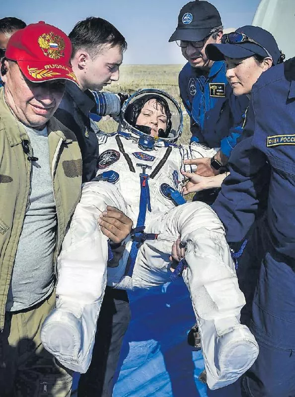 Soyuz Capsule Returns Station Crew to Earth After 204 Days in Space - Sakshi