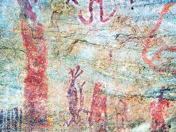 Ten thousand years ago canvas of stone paintings is available in Bhadrachalam forests - Sakshi