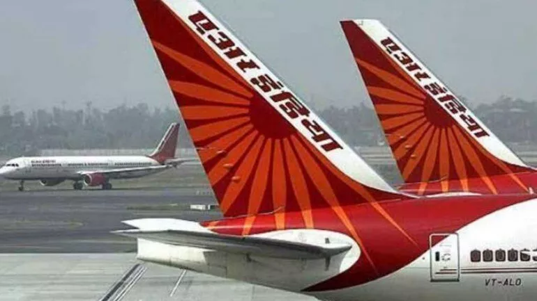 Air India Asked to Pay Rs 47 Thousand for Serving Non Vegetarian Food - Sakshi