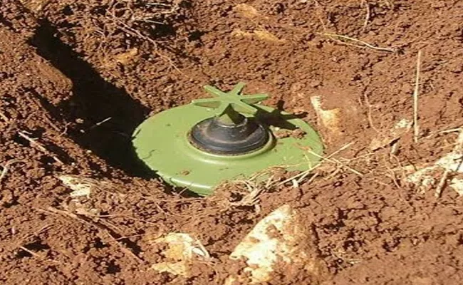officials unearthed 20years ago land mine - Sakshi