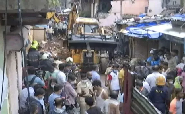 11 Succumb As Building Collapses On Another In Mumbai - Sakshi