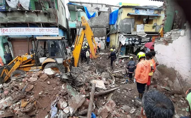 Mumbai Building Collapse Man And Son Saved And 9 Family Members Deceased - Sakshi
