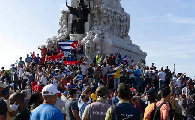 Cuba President Miguel Diaz Blames America Conspiracy Behind Cuba People Anti Govt Protests - Sakshi