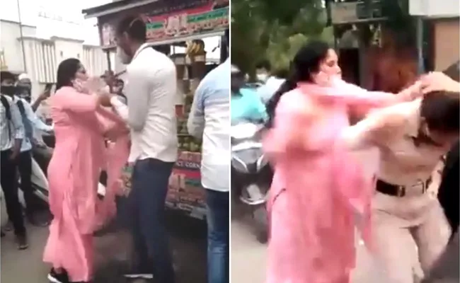Viral: Delhi Woman Slaps Kicks Pulls Hair of Officials Over Mask Issue - Sakshi
