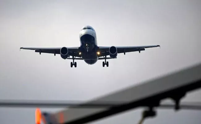 Canada lifts ban on Indian passenger flights - Sakshi