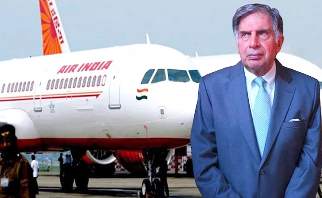 Air India Union group threatens indefinite strike - Sakshi