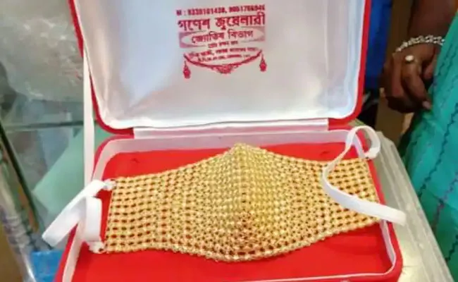 West Bengal Businessman Wears Customised Gold Mask Made With 105 Grams Gold - Sakshi