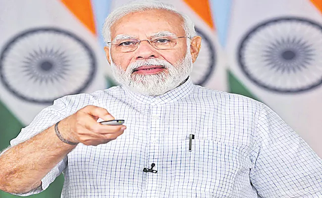 PM Narendra Modi urges people to buy domestic goods - Sakshi