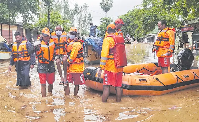 SDRF Widespread relief efforts in flood-affected areas of AP - Sakshi