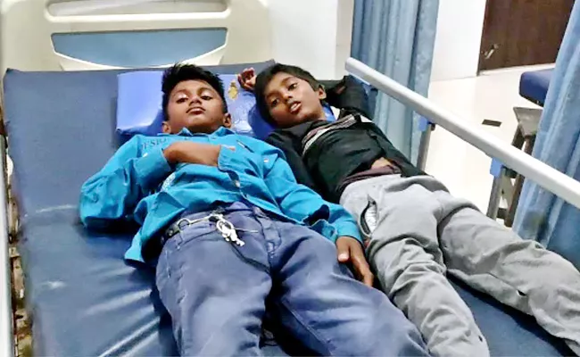 Food poisoning Students Hospitalized At Kagaznagar Gurukulam - Sakshi