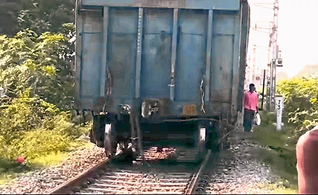 Goods Train Engine Gets Detached Runs Without Bogies In Andhra - Sakshi
