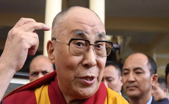 Dalai Lama Apologizes After Child Kissing Video Goes Viral - Sakshi