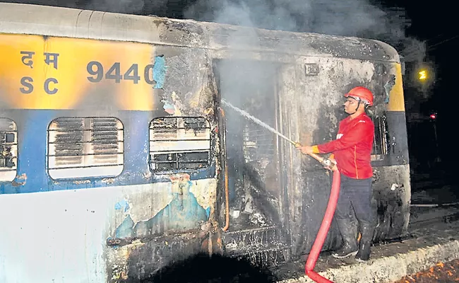 Fire in train carriage - Sakshi