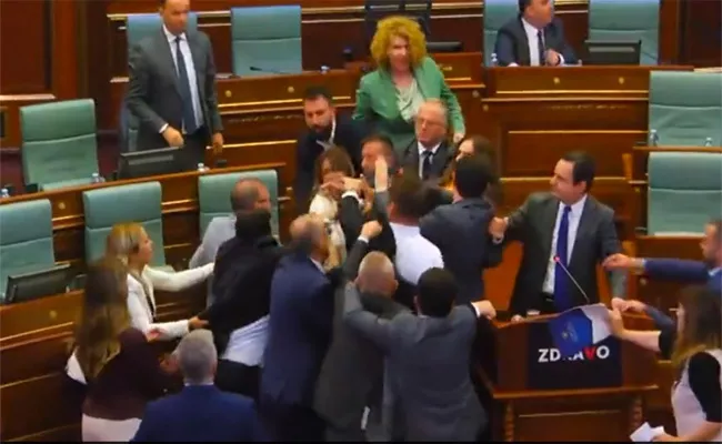 Viral Video: Kosovo Parliament Water Thrown On Prime Minister - Sakshi