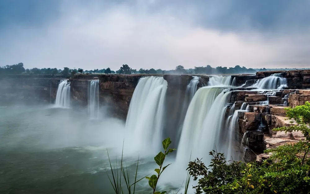 Woman Jumps Into Waterfall In Chhattisgarh Parents Scold  - Sakshi