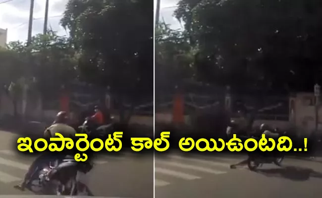Fell Down From The Bike While Using Cell Phone Viral Video - Sakshi