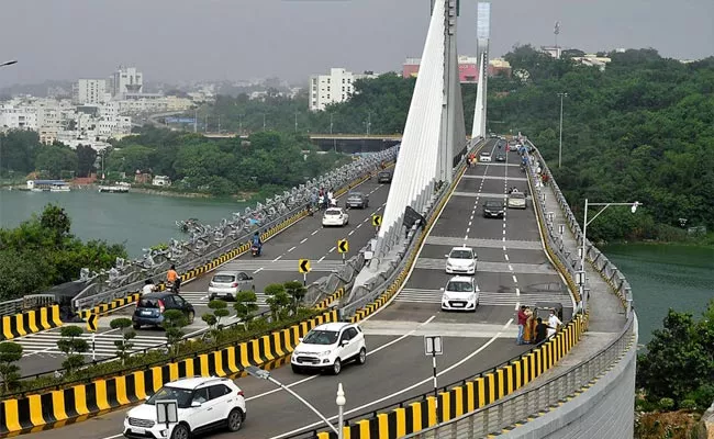 TS Police Says Fine For Parking Vehicles On Cable Bridge - Sakshi