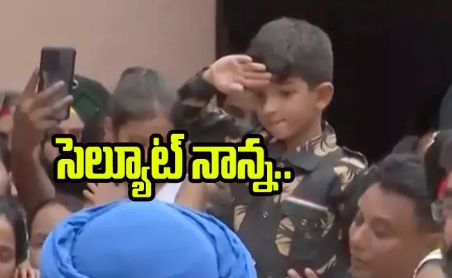 Son Salute In Military Uniform For Colonel Killed In Action In Kashmir - Sakshi