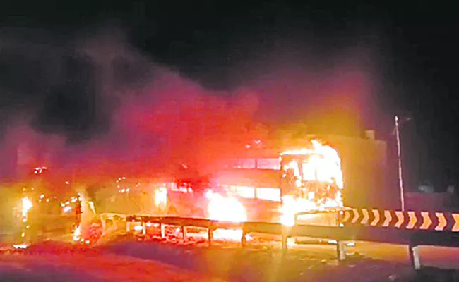 Private Travels Bus catches Fire At Miryalaguda - Sakshi