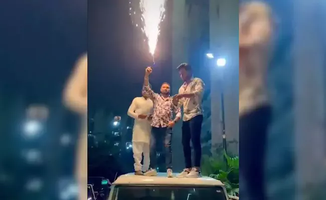 Ghaziabad Men Burst Crackers Throw Currency In Air On Birthday - Sakshi
