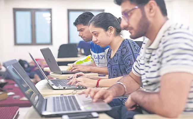 82 per cent of working professionals think they might lose jobs due to AI - Sakshi
