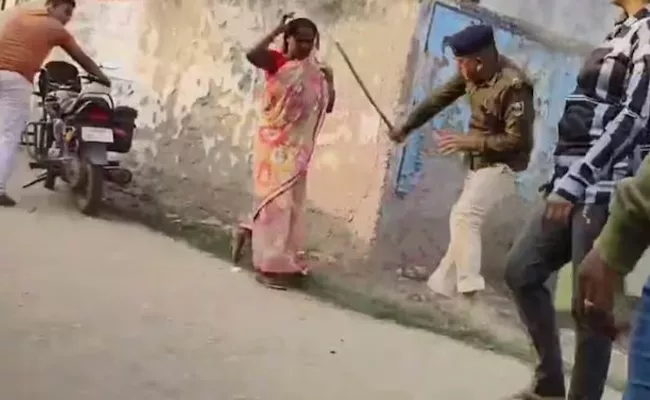 Dalit Woman Thrashed By Cop iIn Bihar - Sakshi