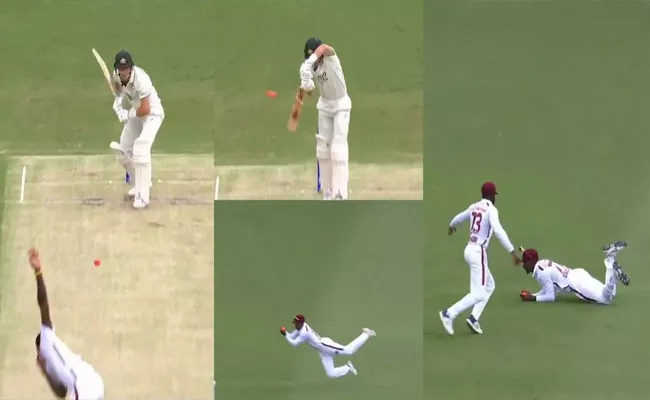 Kevin Sinclair takes a stunning catch to dismiss Marnus Labuschagne - Sakshi