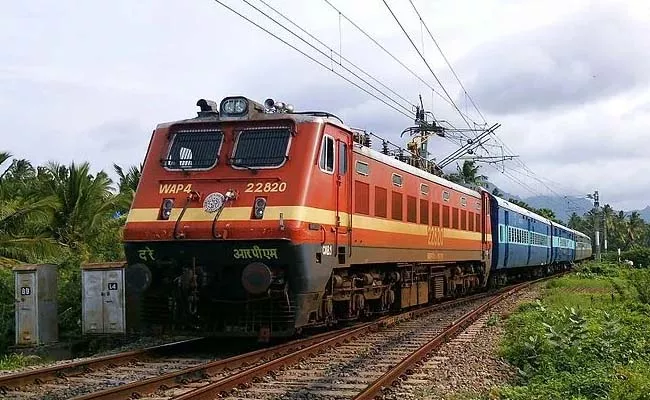 Rs 10000 Fine On Indian Railways For Downgrading 2AC Ticket To 3AC - Sakshi