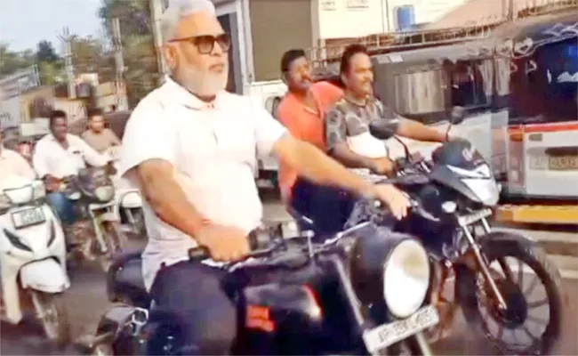 Minister Ambati Rambabu Riding Royal Enfield Bullet - Sakshi