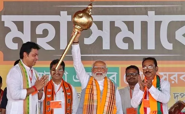 Pm Modi Interesting Comments On Cell Phone Bill In Tripura Election Rally - Sakshi