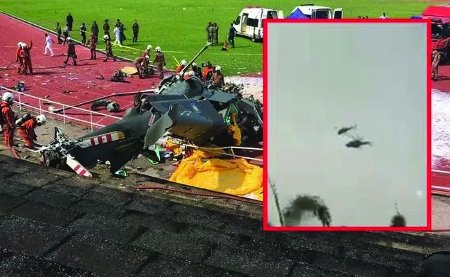10 killed after two Malaysian navy helicopters collide mid air during parade rehearsal - Sakshi