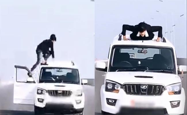 Viral Stunt Video: UP Man Does Pushups On Moving Car - Sakshi