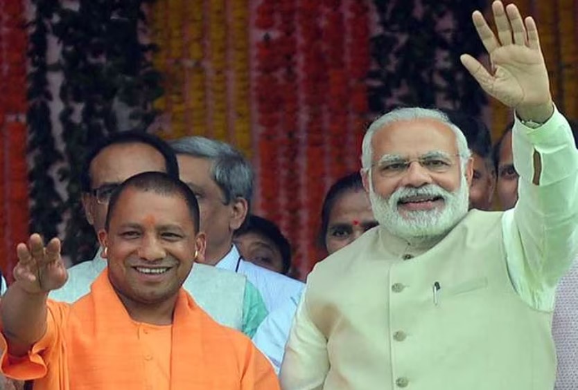 PM Narendra Modi Extends Birthday Wishes To Yogi Adityanath - Sakshi