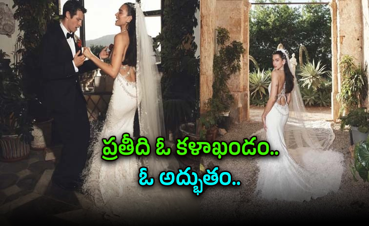 వేల ఈకలు, నాలుగు లక్షల పూసలు..ఏకంగా రూ. 1,155 గంటల ఎంబ్రాయిడరీ