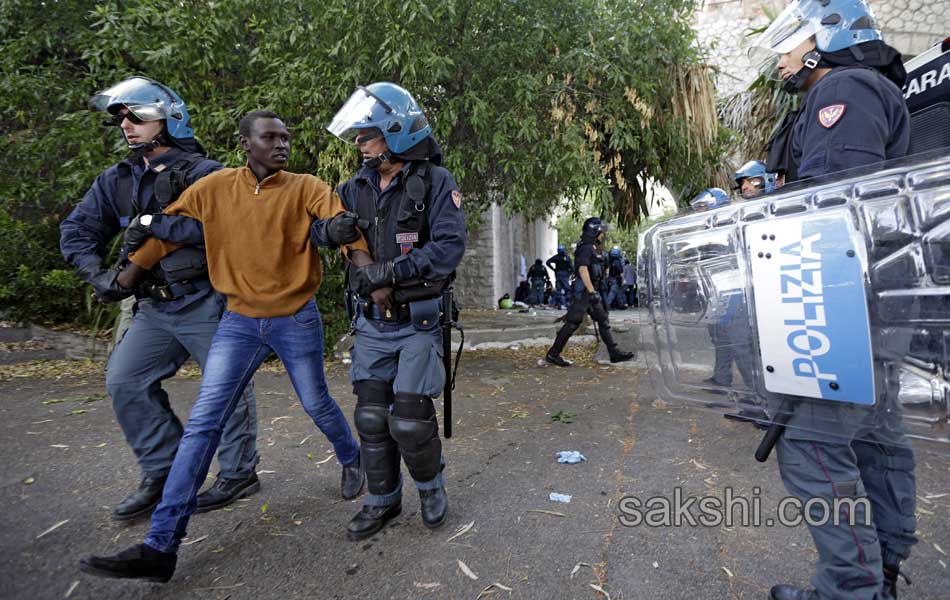 Italy threatens to give Schengen visas to migrants as EU ministers meet14