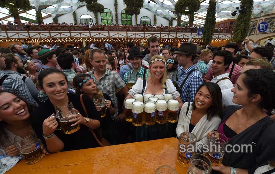 Visitors enjoys the Oktoberfest beer festival in Munich Germany2