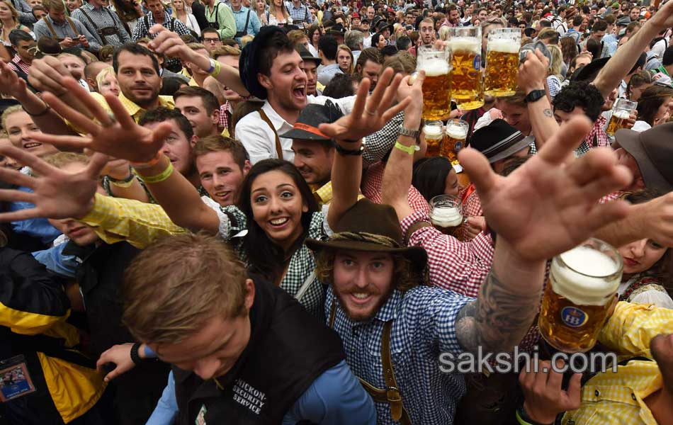 Visitors enjoys the Oktoberfest beer festival in Munich Germany8