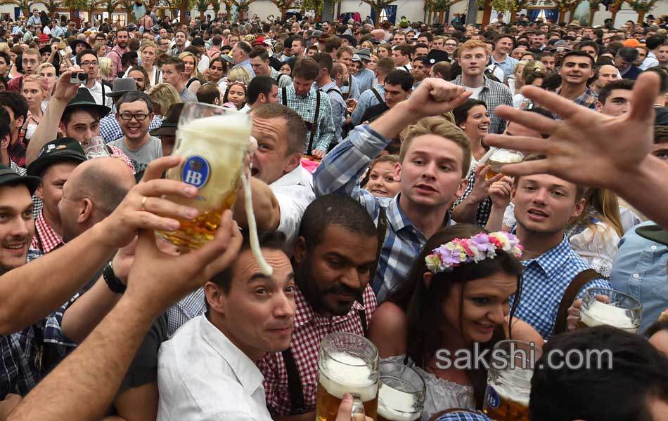 Visitors enjoys the Oktoberfest beer festival in Munich Germany17