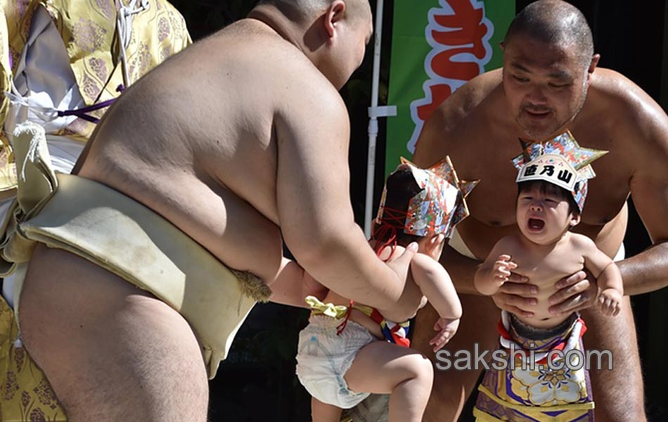 These Sumo Wrestlers Make Babies Cry It Out For Good Health7