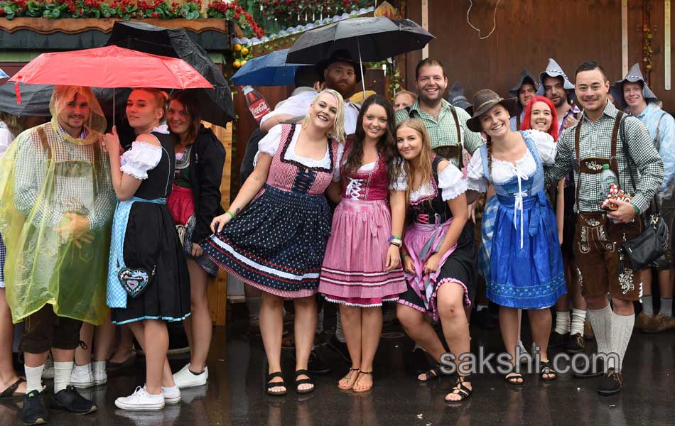 Visitors enjoys the Oktoberfest beer festival in Munich Germany11