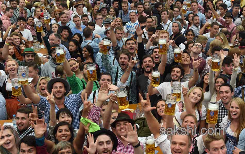 Visitors enjoys the Oktoberfest beer festival in Munich Germany3