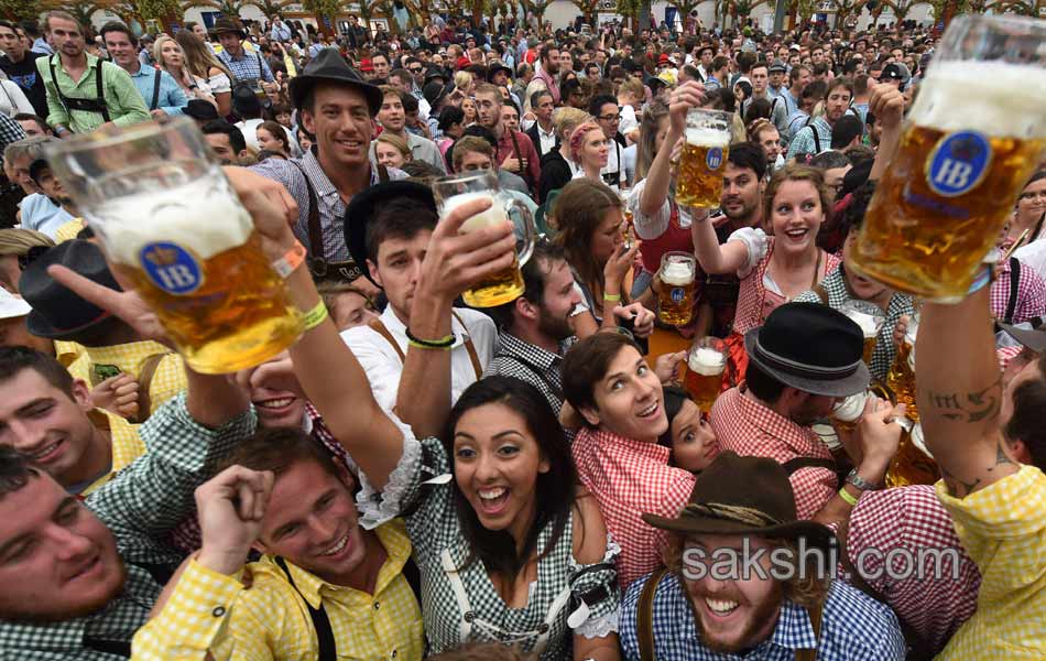 Visitors enjoys the Oktoberfest beer festival in Munich Germany6